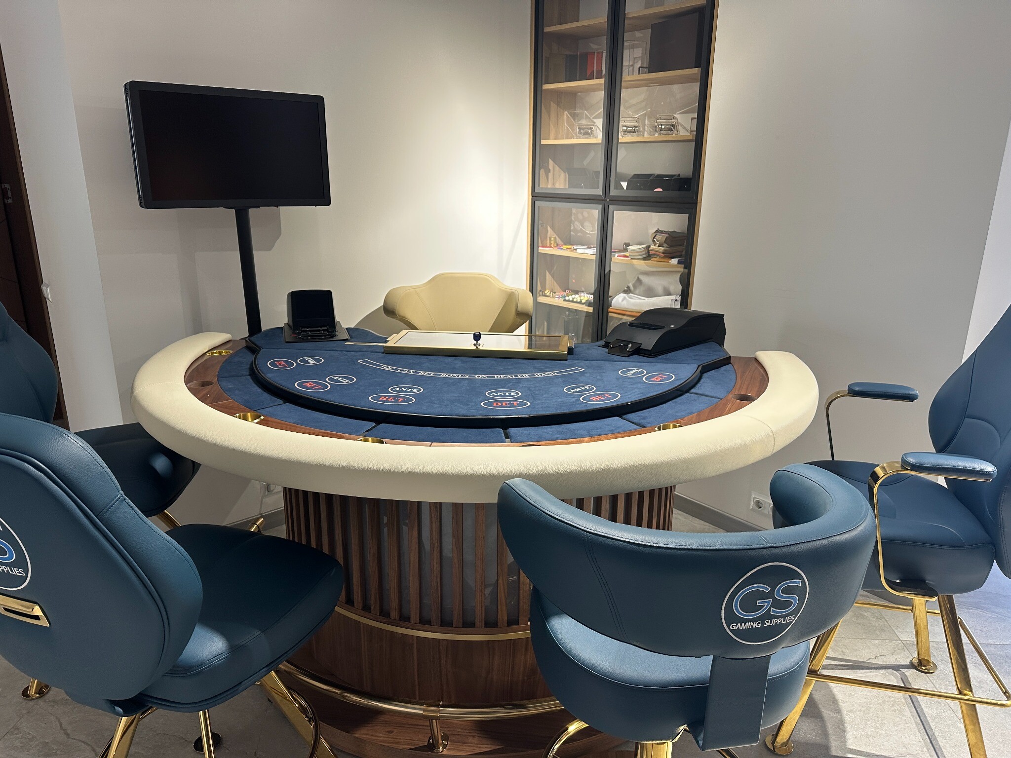 Casino poker table and GS-branded chairs in the Gaming Supplies Batumi showroom